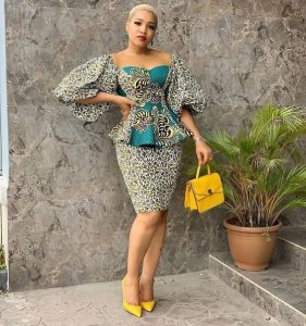 Birthday ladies ankara short skirt and blouse style with low cut hairstyle and matching hand bag and shoes - instagram