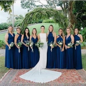 cute bridal pose with bride wearing a white overflowing wedding dress - bridefeed