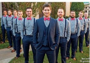 groomsmen lined up in v shape with groom at the center - bridalore