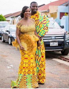 john dumelo on a photo shoot slay with his wife both on kente outfit - mammypi