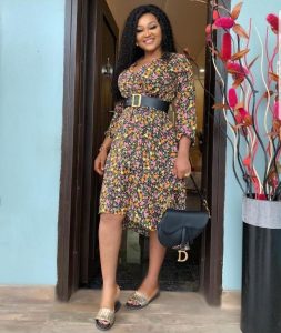 mercy aigbe's cute short ankara gown with belt