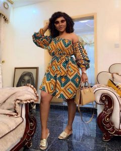 mercy aigbe stylish short flay gown with puffed sleeves