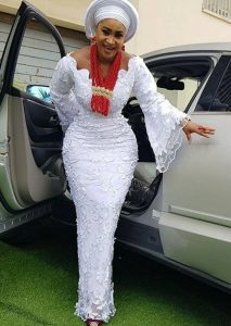 unique ankara lace skirt and blouse with gele hair tie for traditional wedding and church