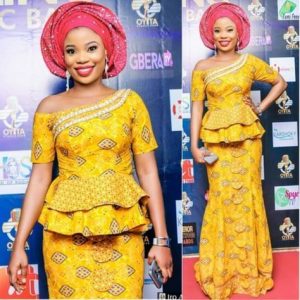 one side off shoulder ankara peplum blouse with long mermaid skirt style with gele hair tie