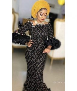 trending ankara lace long gown with puffed sleeve, with gele hair tie, wedding fashion style