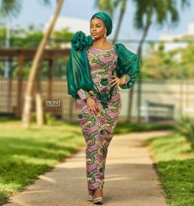 cute ankara long gown style with puffed sleeve for church and wedding
