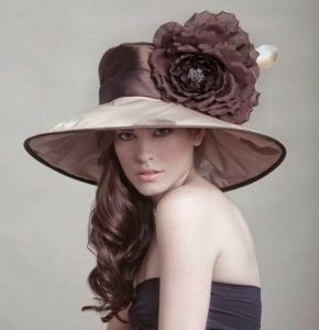 classy fascinator hat style with rose flower design for long hair